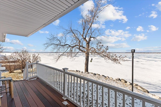 view of snow covered deck