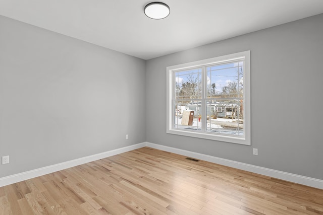 empty room featuring light hardwood / wood-style floors