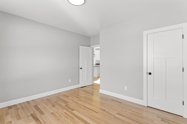 unfurnished bedroom with light hardwood / wood-style flooring