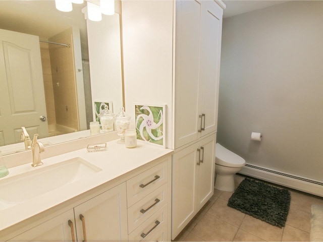 bathroom with a baseboard radiator, toilet, tile patterned floors, and vanity