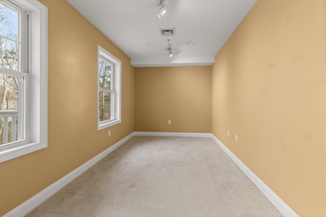 view of carpeted spare room