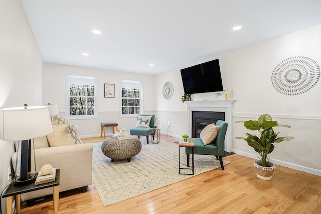 living room with light hardwood / wood-style floors