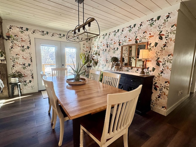 dining room with french doors, wood ceiling, and dark hardwood / wood-style flooring