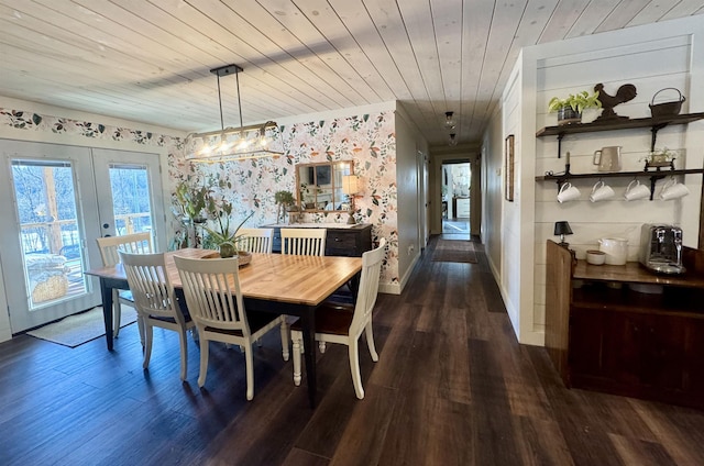 dining room with wooden ceiling, dark wood-type flooring, and french doors