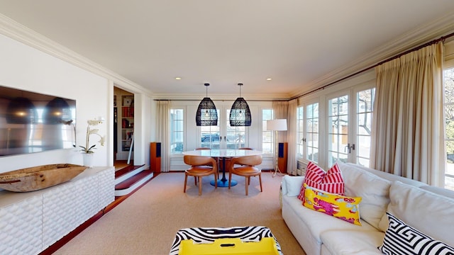 living room featuring french doors and ornamental molding