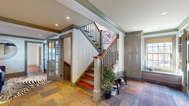 stairway featuring crown molding and french doors