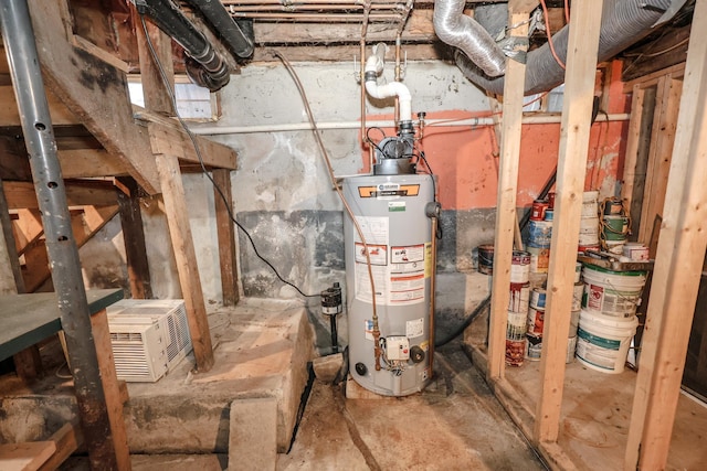 utility room featuring gas water heater