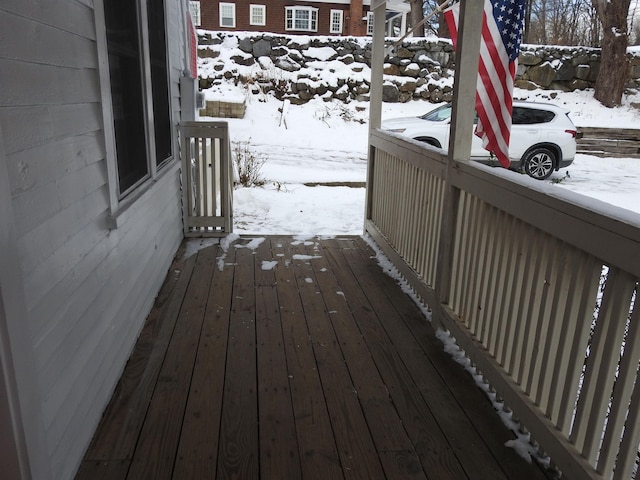 view of snow covered deck