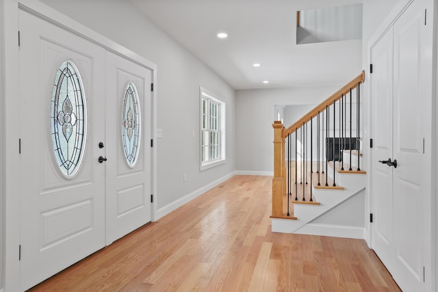 foyer with light wood-type flooring