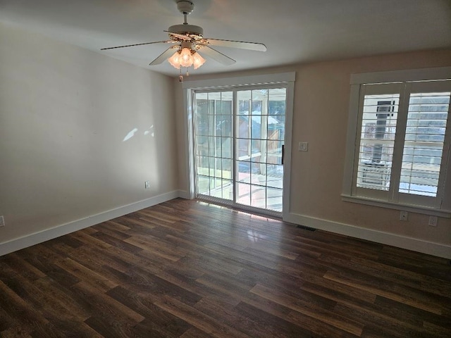 unfurnished room featuring ceiling fan and dark hardwood / wood-style flooring