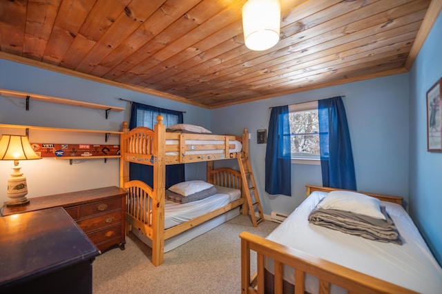 carpeted bedroom with baseboard heating, wood ceiling, and ornamental molding