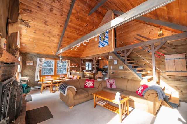 living room featuring track lighting, wood walls, beam ceiling, and wooden ceiling