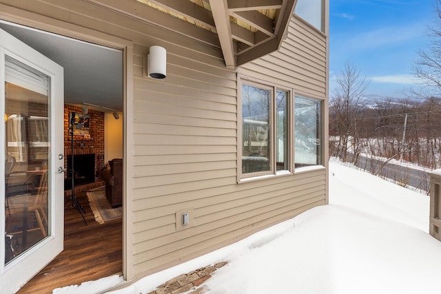 view of snow covered property