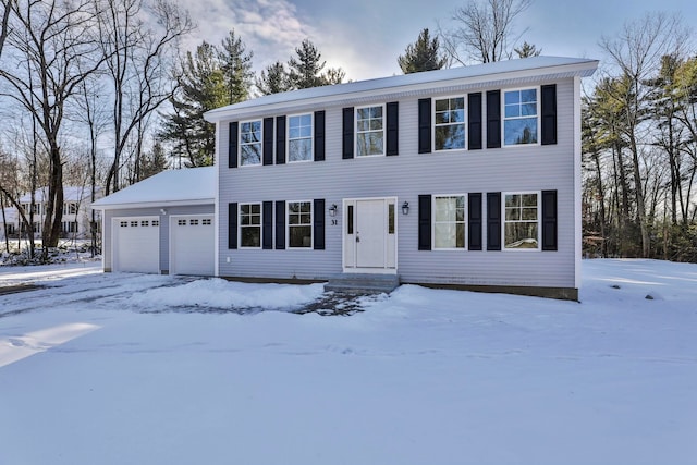 colonial home featuring a garage