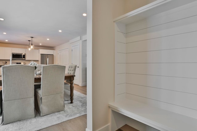 dining area with light hardwood / wood-style flooring