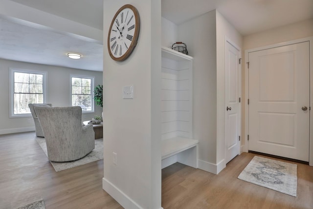 hallway featuring light wood-type flooring