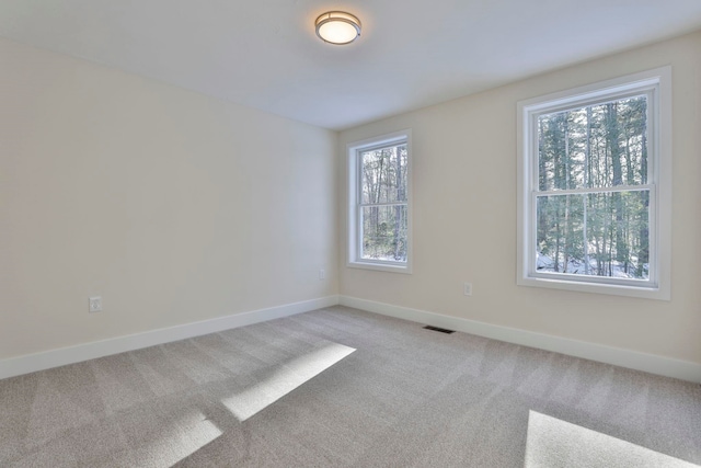 view of carpeted spare room