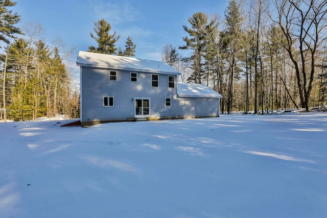 view of snow covered house