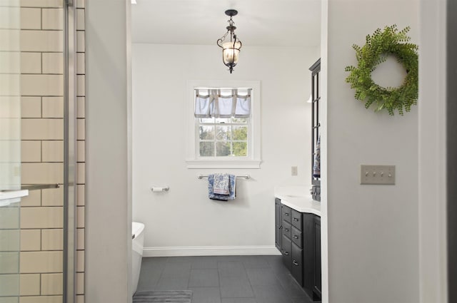 bathroom featuring vanity, tile patterned flooring, and a shower with shower door