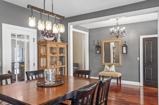 dining area featuring dark hardwood / wood-style flooring