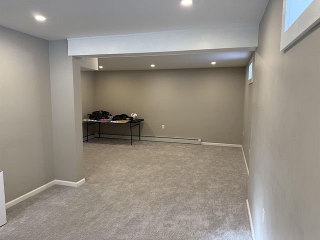 below grade area featuring carpet flooring, recessed lighting, and baseboards