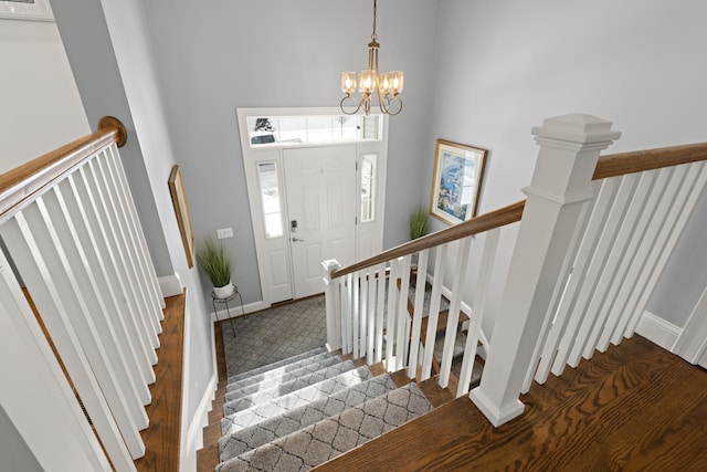 foyer featuring a notable chandelier