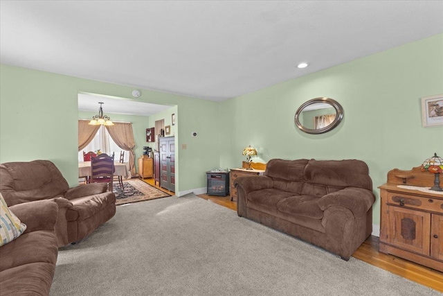 living room with an inviting chandelier