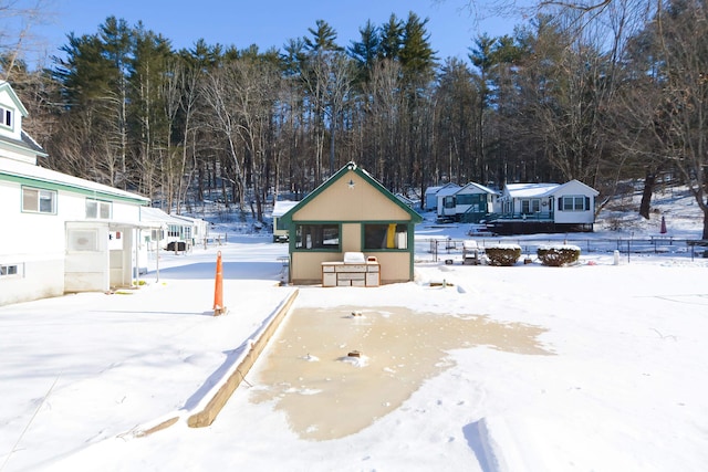 view of yard covered in snow