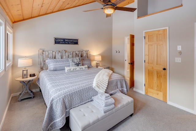 carpeted bedroom with ceiling fan, vaulted ceiling, and wooden ceiling