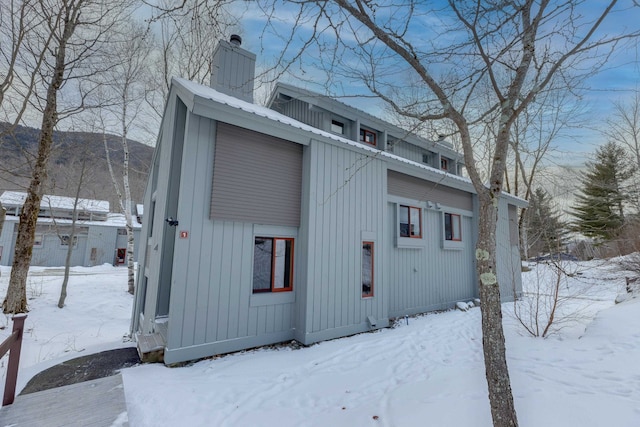 view of snow covered property