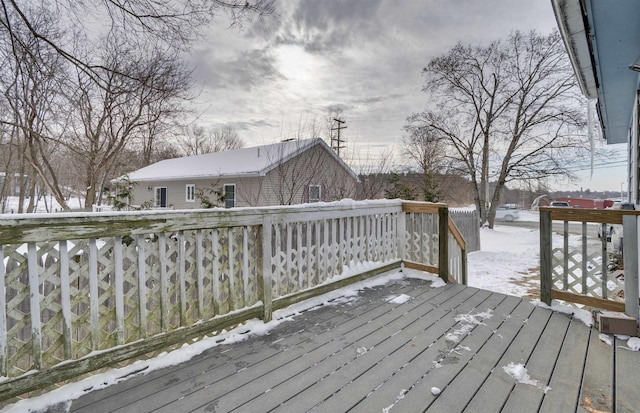 view of snow covered deck