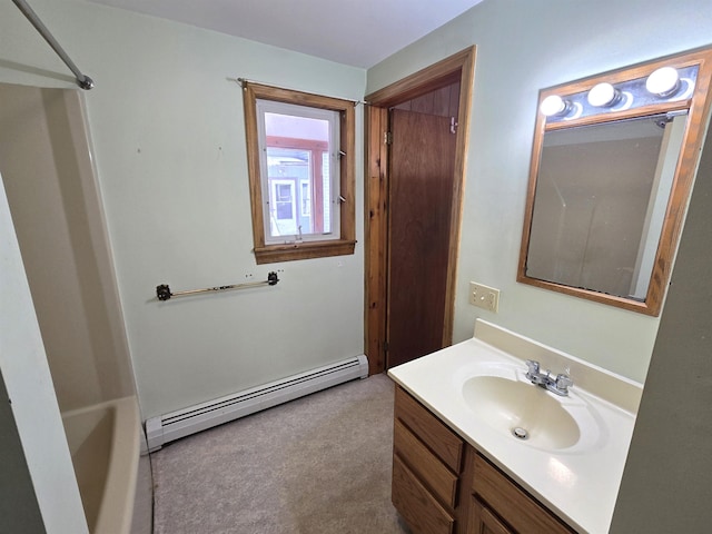 bathroom with vanity and a baseboard radiator