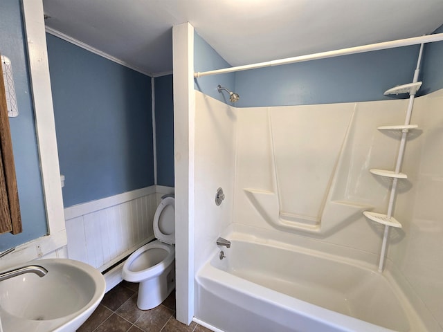 full bathroom featuring tile patterned flooring, sink, shower / bathtub combination, and toilet