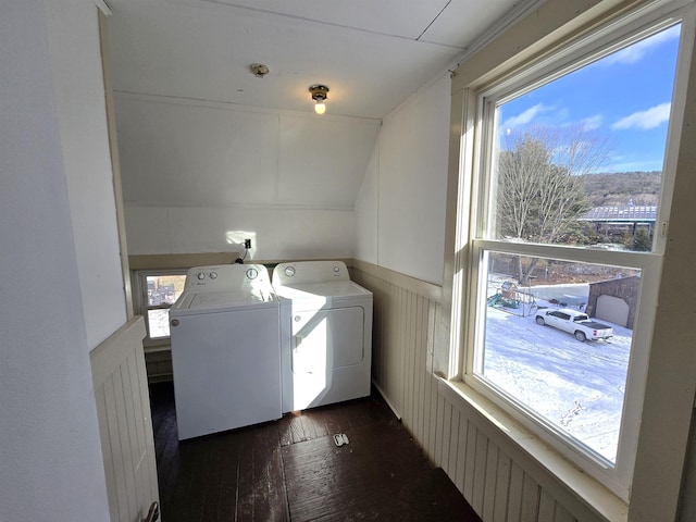 washroom with washing machine and clothes dryer