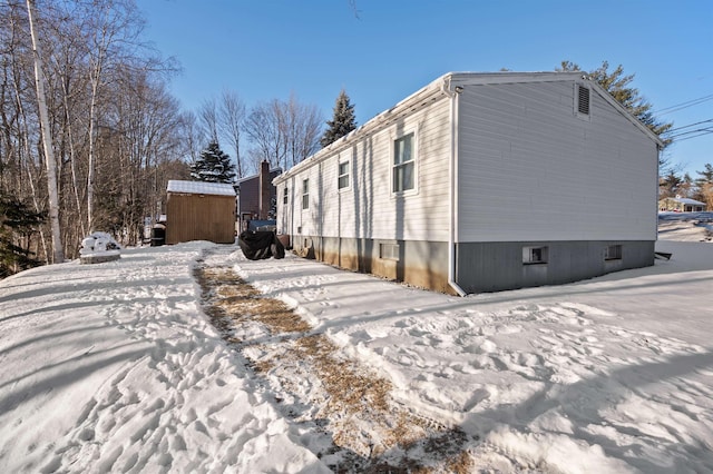 view of snow covered property