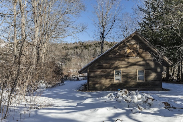 view of snow covered property