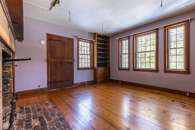 foyer entrance featuring hardwood / wood-style floors