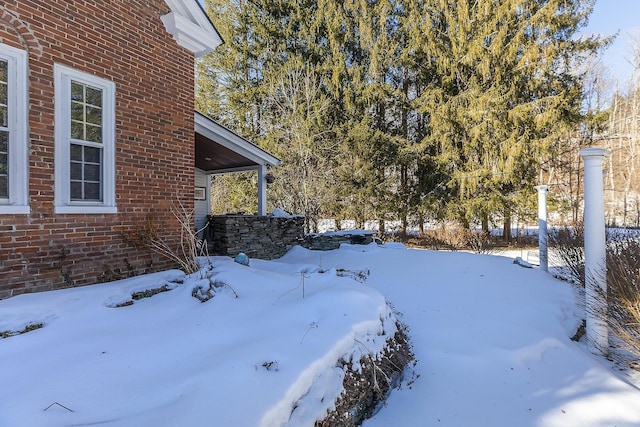 view of snowy yard