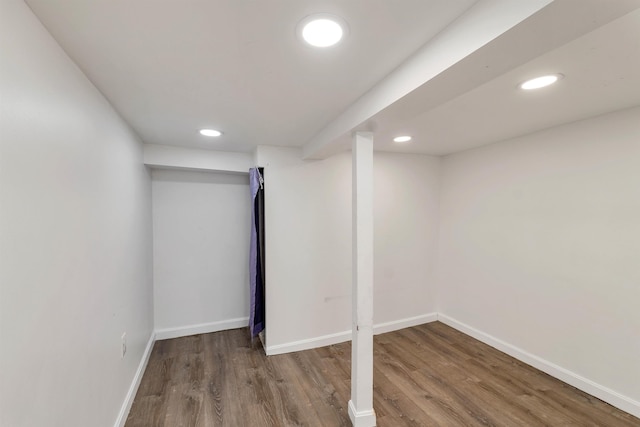 basement featuring hardwood / wood-style flooring