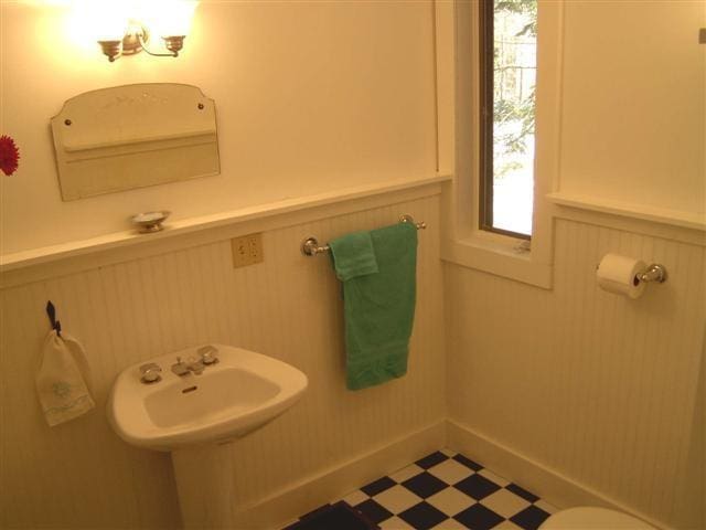 bathroom featuring sink and tile patterned flooring