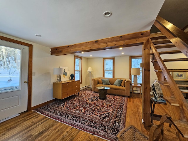 living room featuring hardwood / wood-style flooring and a baseboard radiator