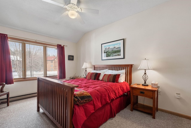 carpeted bedroom featuring a baseboard radiator, lofted ceiling, and ceiling fan