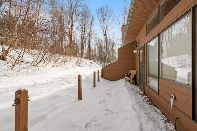 view of yard covered in snow