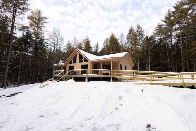 exterior space featuring a wooden deck