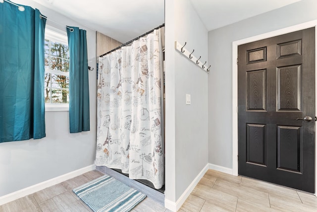 bathroom with curtained shower