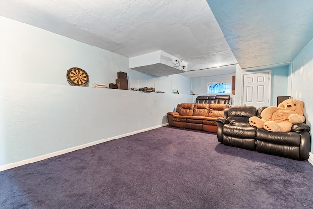 living room with carpet and a textured ceiling