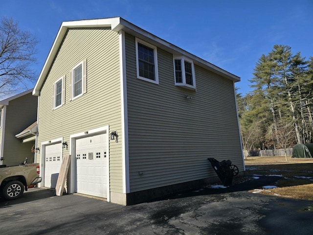 view of home's exterior featuring a garage