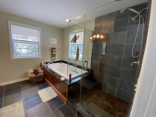 bathroom with shower with separate bathtub