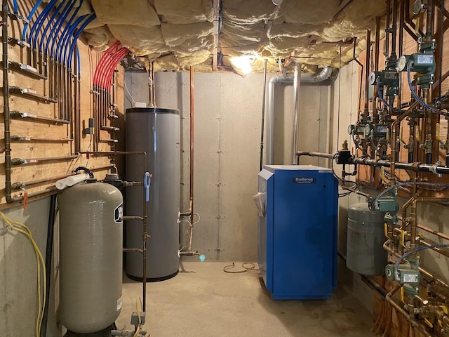 utility room featuring water heater