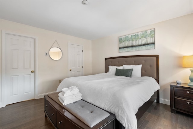 bedroom featuring dark hardwood / wood-style floors